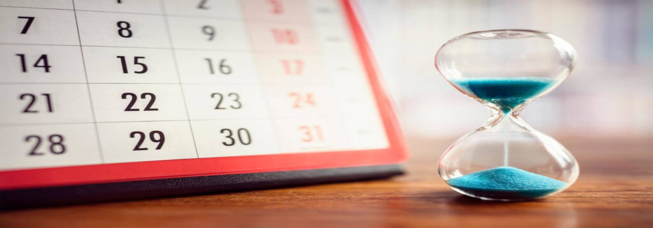 a calendar and an hour glass